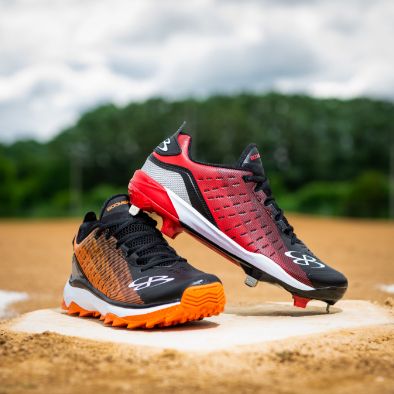 Two baseball cleats on base