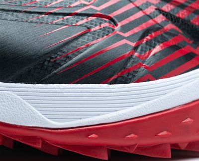 Red and black Chellenger baseball shoe