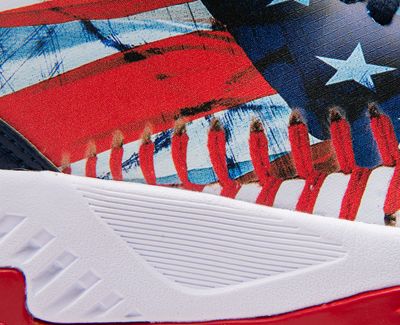Red, white and blue Dart baseball shoe