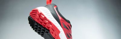 Red and black Challenger baseball shoe