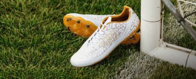 pair of yellow soccer cleats